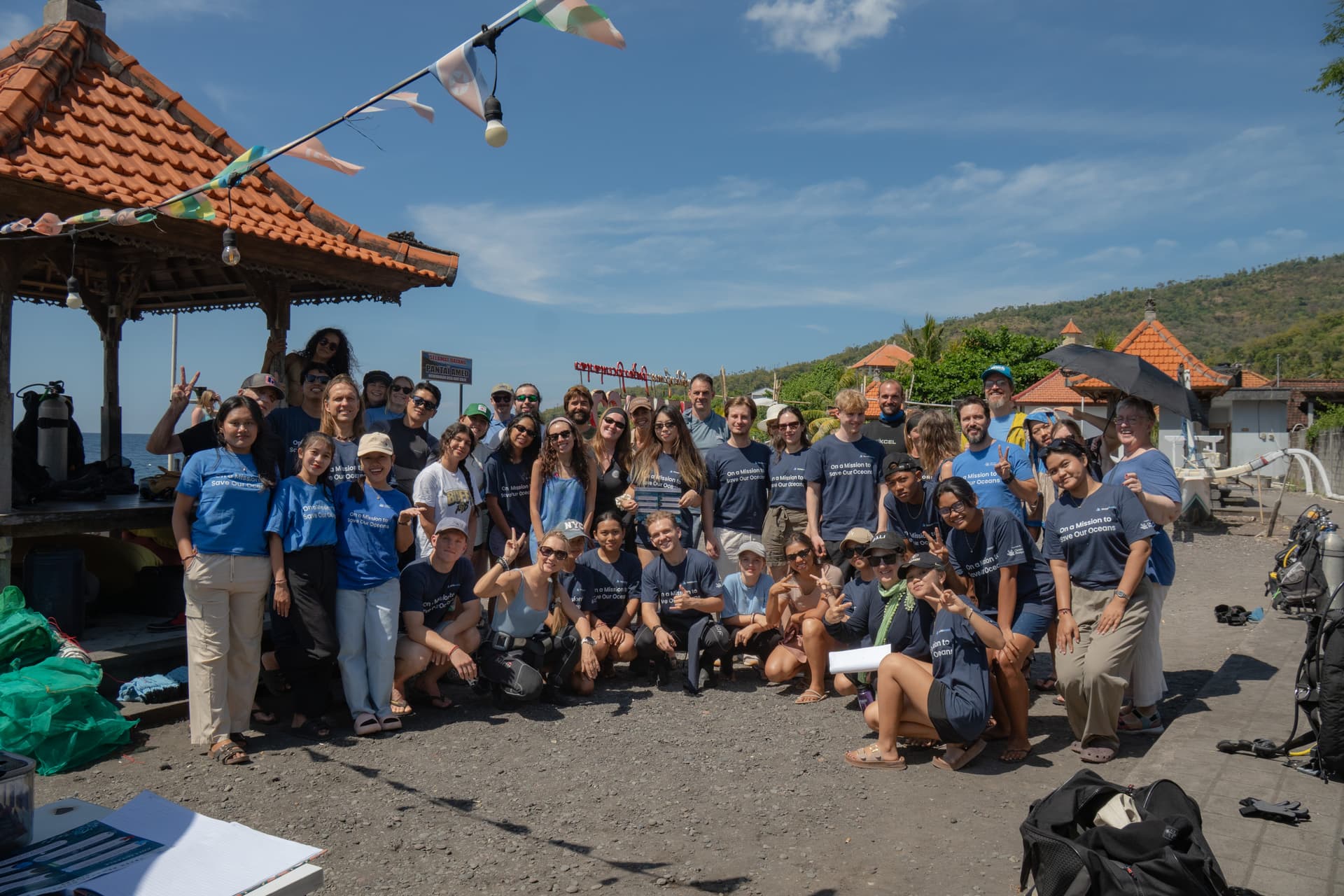 The TraderWaves team taking part in a sponsored beach clean-up in Bali